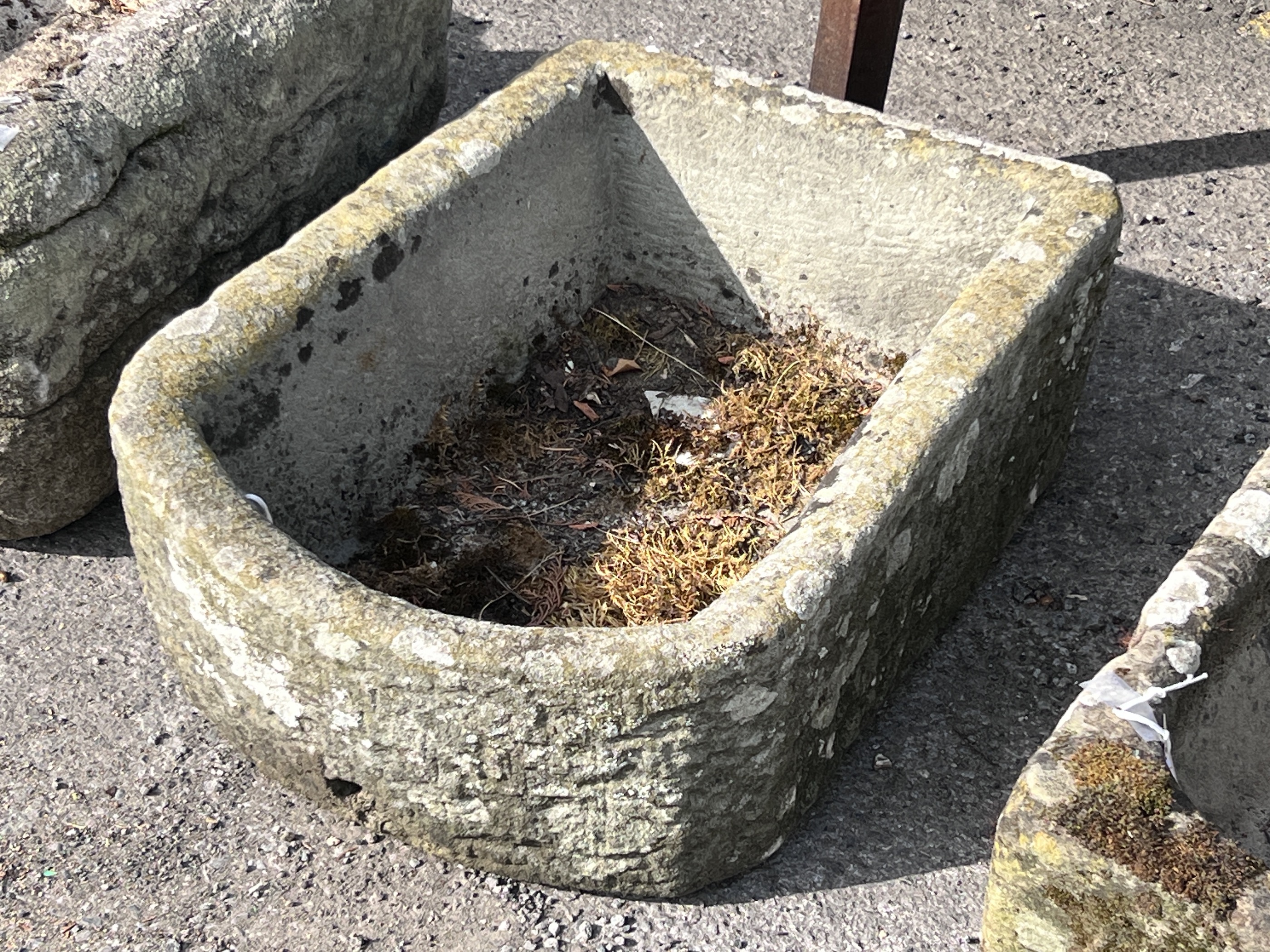A stone trough, length 62cm, height 43cm